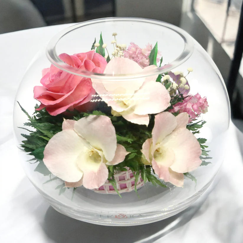 Serenity in Bloom: Everlasting Pink Roses and Orchids