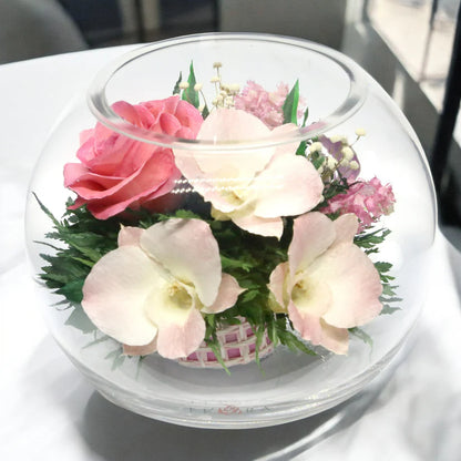 Serenity in Bloom: Everlasting Pink Roses and Orchids