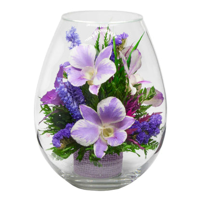 Breathtaking Purple Orchids in a Droplet-Shaped Glass Vase