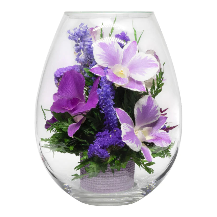 Breathtaking Purple Orchids in a Droplet-Shaped Glass Vase