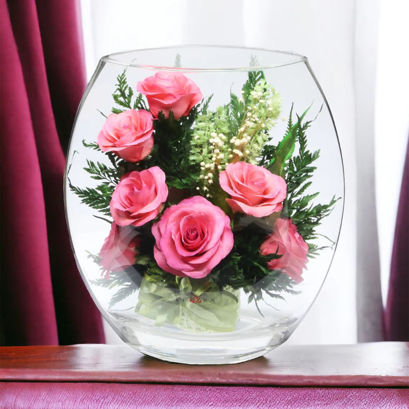 Seven Stunning Pink Roses in a Glass Vase for Enduring Elegance