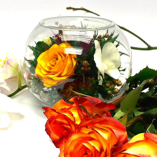 Timeless White Orchids and Roses in a Classic Round Glass Vase